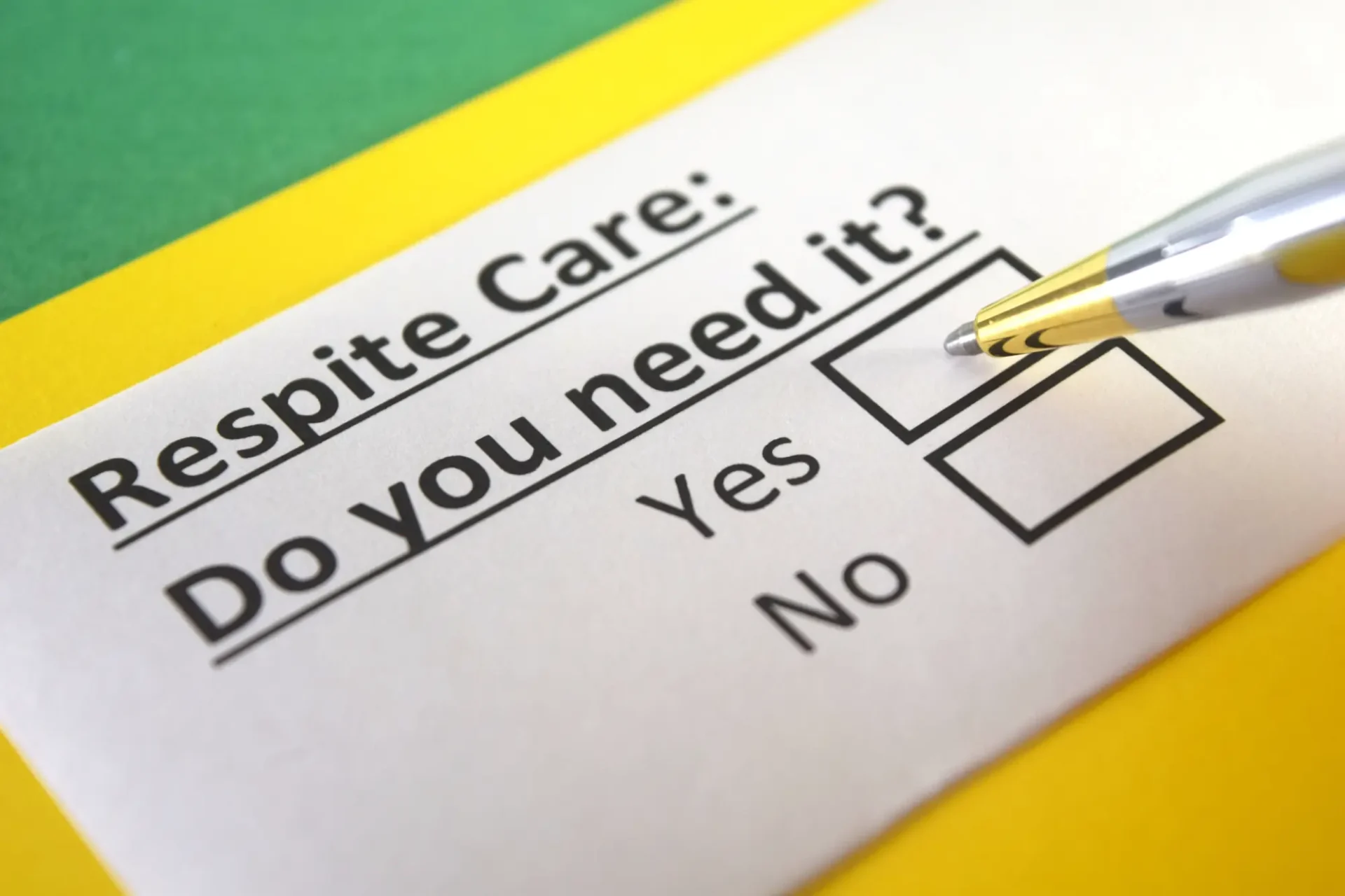 A pen points to a checkbox on a form with the question "Respite Care: Do you need it?" and options for "Yes" and "No.